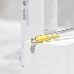Dropper with yellow liquid