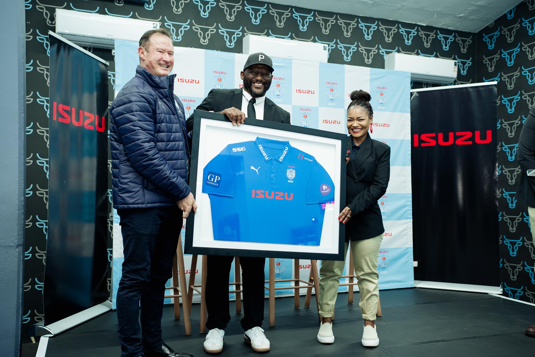 ISUZU Bulls Daisies. Willem Strauss (President, Blue Bulls Rugby Union), Ziphindiwe Ngcobo (ISUZU Department Executive, Marketing), Thando Manana (Executive, Strategic Projects and Women's Rugby at Blue Bulls Rugby)