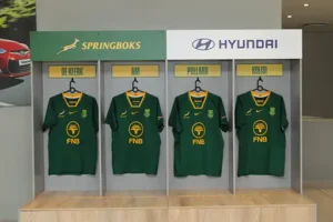 Hyundai Springboks partnership. Display of Springbok rugby jerseys with names De Klerk, Am, Pollard, and Kolisi, sponsored by Hyundai.