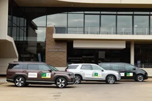 Hyundai Springboks partnership. Three Hyundai vehicles parked outside the Hyundai Training Academy building.