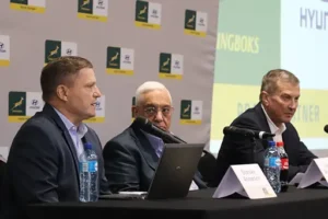 Hyundai Springboks partnership. Press conference with SA Rugby and Hyundai representatives, featuring logos and microphones on the table