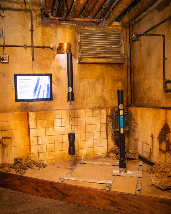 An exhibit display showing the SharkSafe Barrier technology at the Shark Smart Exhibition.