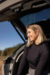 Jetour X70 Plus. Rachel Kolisi standing at the Boot of her X70 Plus
