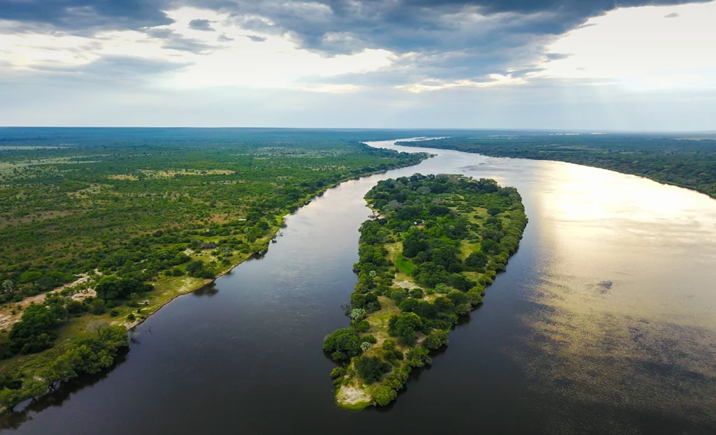 An aerial view of Chundu Island on the Zambezi River, a perfect addition to any Hippo Creek Villa safari Victoria Falls.