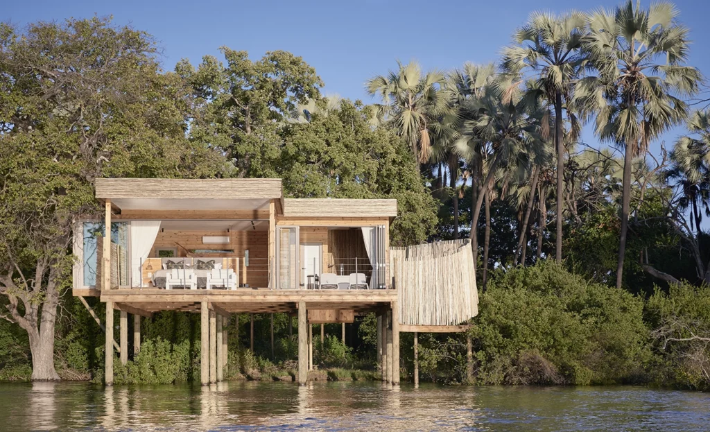 A treehouse lodge at Victoria Falls Island Lodge on the Zambezi River, offering a unique stay near Hippo Creek Villa safari Victoria Falls.