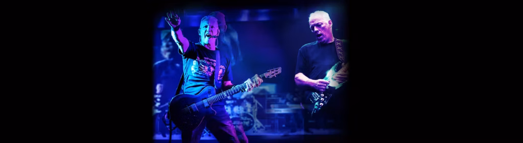 1920x525.avif: Live performance image of two musicians from the Steve Graham Pink Floyd Tribute show.
