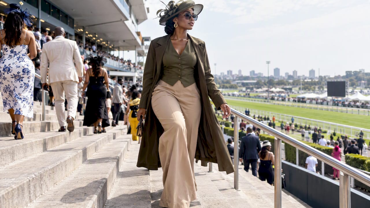 Racegoer wearing wide-leg trousers and a waistcoat