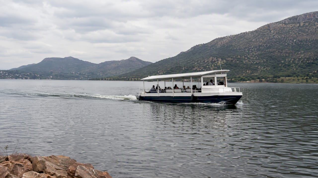 Cruise boat crossing Hartbeespoort Dam